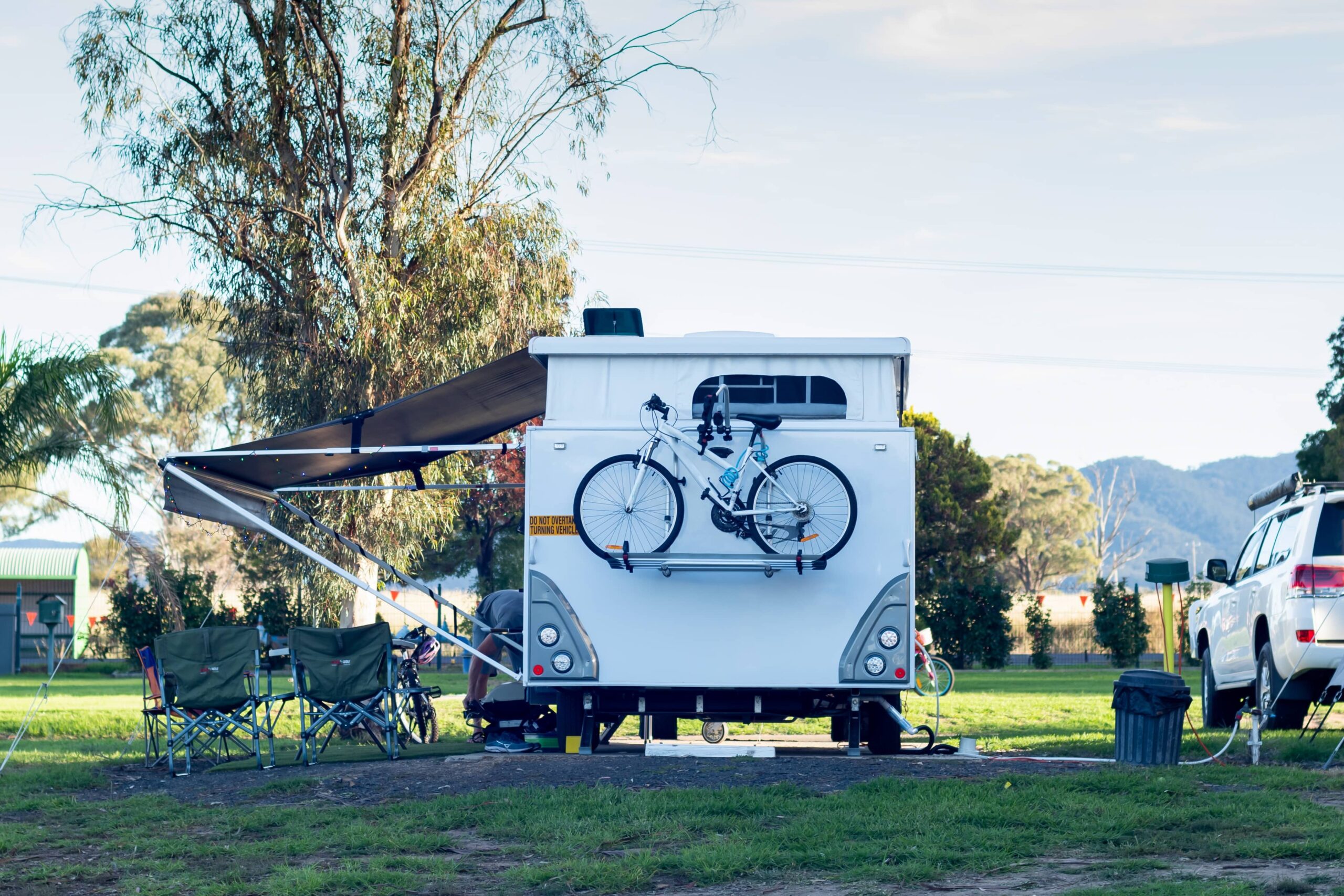 rv-caravan-with-bike-on-the-back-camping-at-the-ca-2022-11-15-14-04-23-utc (1)